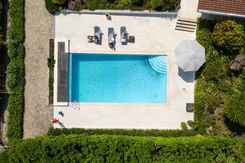 Paredes Apartment | HostWise - Modern Villa & Shared Pool in Paredes