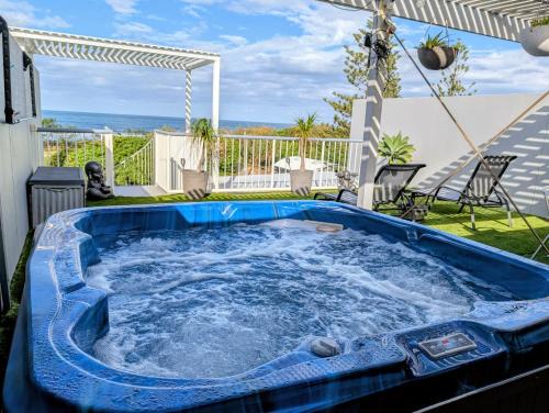 Marcoola Apartment | Marcoola Beachfront, private rooftop spa with stunning views!