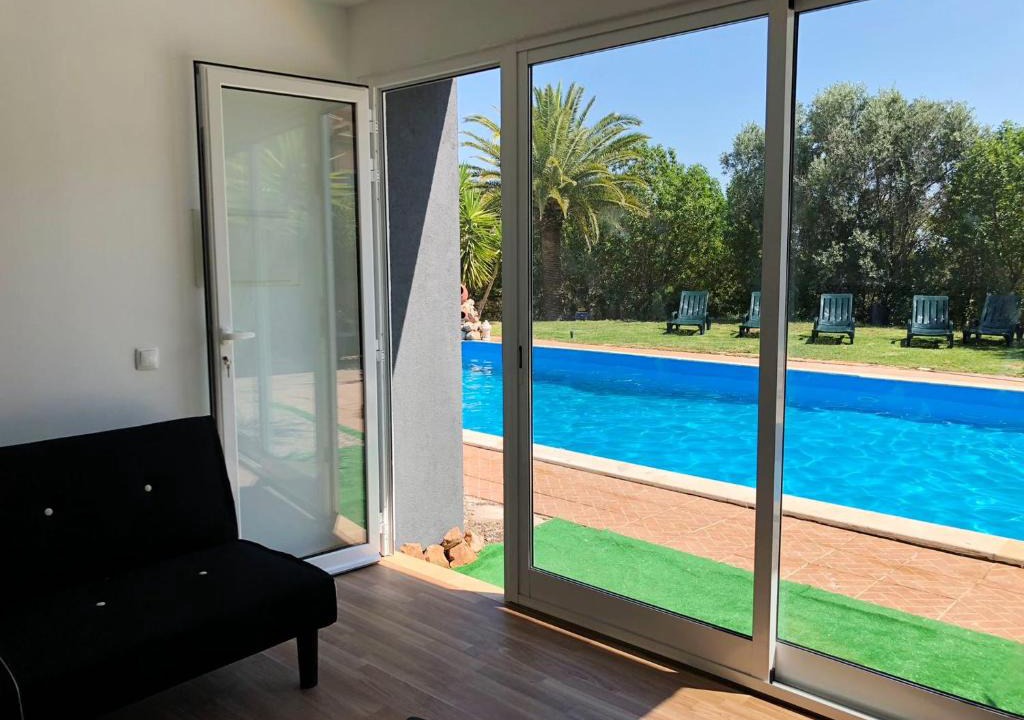 Silves House | One bedroom bungalow with shared pool enclosed garden and wifi at Silves