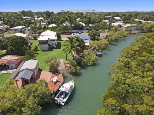 South Townsville House | Riverfront Retreat - Fish from Deck with Boat Ramp