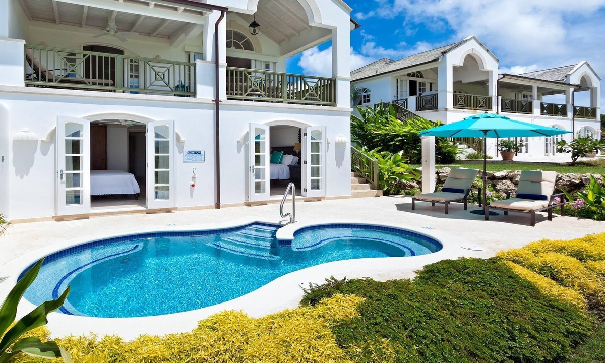 Merlin Bay Villa | Royal Westmoreland-Cherry Red in St James by Personal Villas - Modern Caribbean Villa with Pool Deck