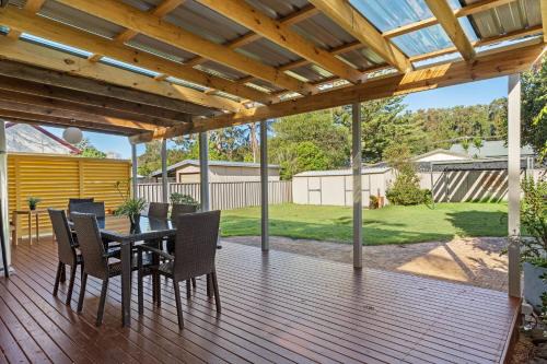 Budgewoi House | The Lazy Mimosa Beach Escape Fishing, Bikes & Cozy Firepit
