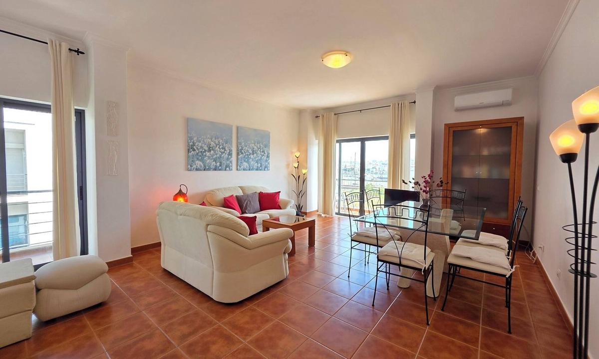 Meia Praia Apartment | Top floor apartment- beach, town & harbor, elevator, A/C, WiFi, private parking