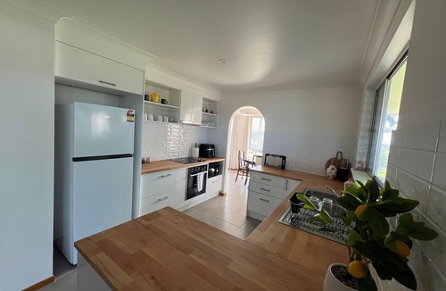 Woolgoolga House | 3 bedroom cottage with ocean views fully furnished with ample space for the kids