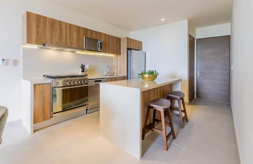 Akumal Condo | 5 Rooftop Pools & Beach Club with Ocean Access