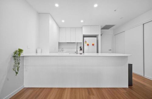Mitchelton Apartment | Across from Train and Bus Station Pool Gym and View