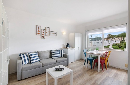 Santa Eulalia Apartment | Apartment 'Sun and Serenity' with Shared Pool, Shared Garden and Wi-Fi