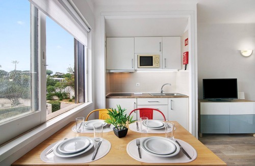 Santa Eulalia Apartment | Apartment 'Sun and Serenity' with Shared Pool, Shared Garden and Wi-Fi