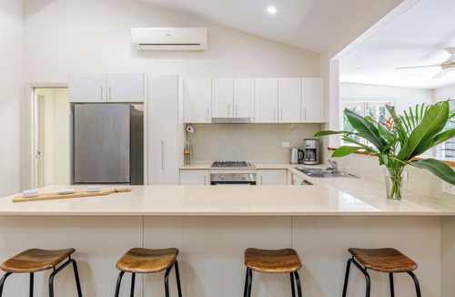 Port Douglas Cottage | Atoll Close Queenslander with private heated pool