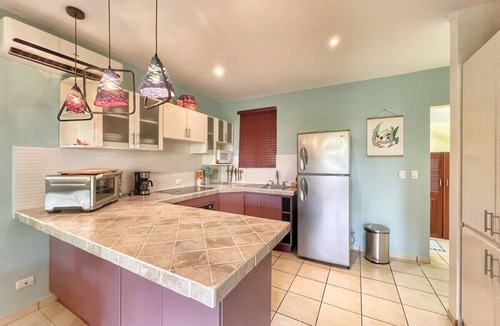 Coco Sunset Hills Condo | Coco Boho Condo | Steps to Pool | Walk to Beach