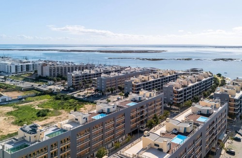 Olhao Apartment | Elegant 2 BDR Flat W/Rooftop Pool by LovelyStay