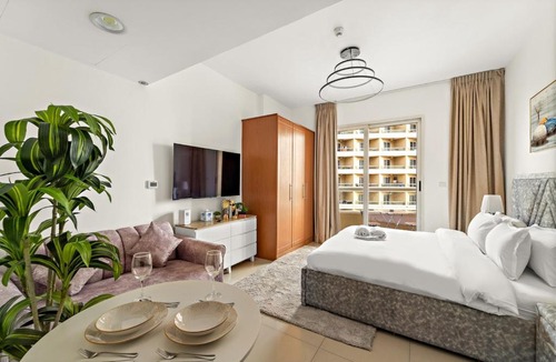Dubai Production City Apartment | FIRST CLASS Studio Cozy & Chic Retreat