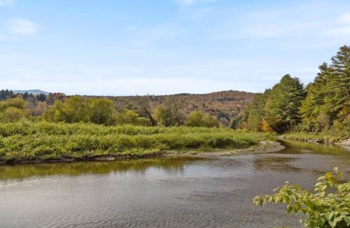 Johnson House | Haven Tiny House w hot tub on river near Stowe