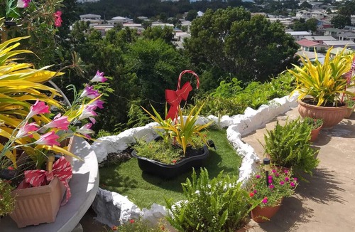 Rendezvous Apartment | Hillside view and a pool