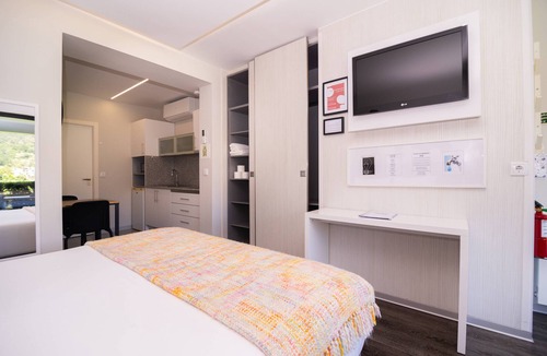 Santana House | Lower-level Studio w/kitchenett and patio