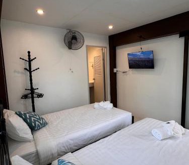 Fai Kaeo Bed & Breakfast | Luxe Nan Twin Bed Room