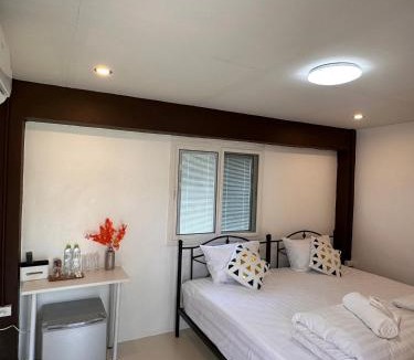 Fai Kaeo Bed & Breakfast | Luxe Nan Twin Bed Room