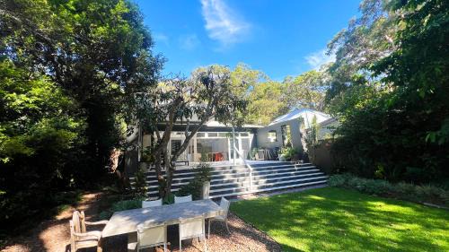 Pearl Beach House | Luxury Pearl Beach House with Private Heated Mineral Pool, Yoga Deck & Fire Pit