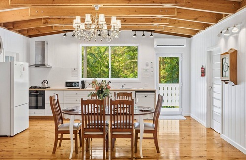 Springbrook House | Luxury Romantic Rainforest Cottage, waterfall area, firepit, fireplace.