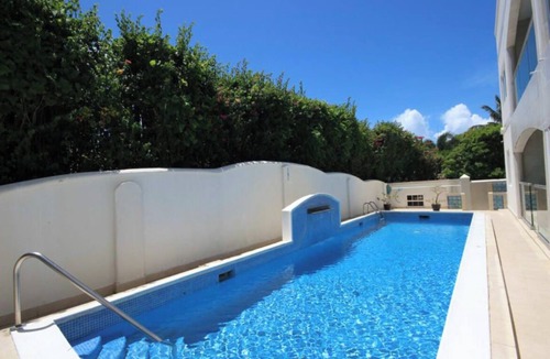 Green Garden Villa | Marvelous 3-bedroom Apartment in Villa, Beautiful Pool, Steps from Surf & Ocean