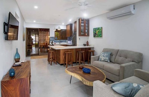 Coco Apartment | Minimalist Condo with a Beautiful New Design, Enclosed Patio, and Shared Community Pool