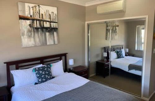 Barney Point Apartment | Modern Beach Apartment