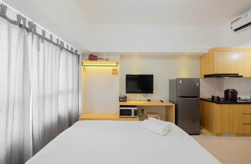 Bekasi Apartment | Modern Studio @ Springlake Summarecon Apartment By Travelio