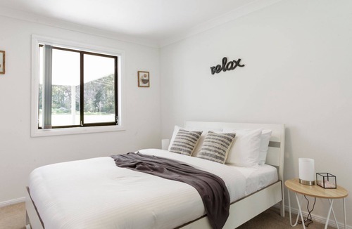 Woollamia House | Pines Escape is bright and spacious with a lovely homely feel