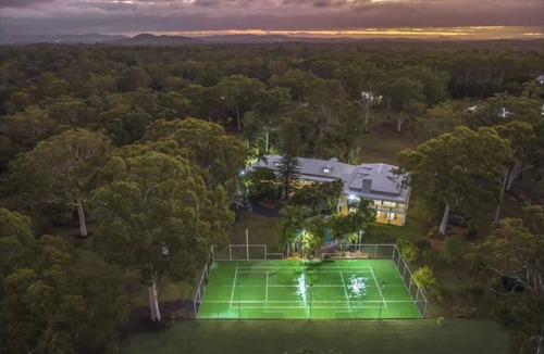 Carbrook House | Relax with your whole family at this serene resort-style retreat.