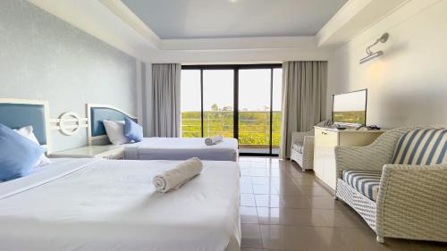 Trang Hotel | Rua Rasada Express
