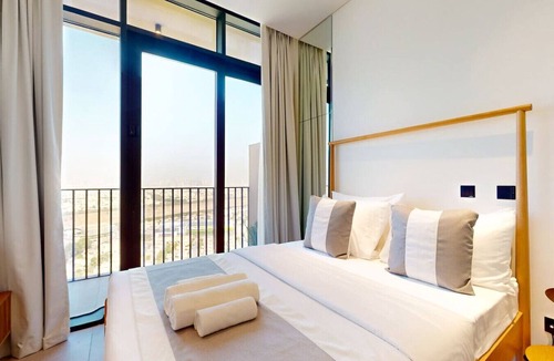 Jumeirah Village Triangle Apartment | Skyline Views: Sunset Studio with Balcony