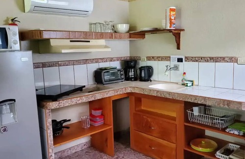 La Fortuna Apartment | Sleeps 2 - Studio Apart.- AC - Hot water - Kitchenette - Pool