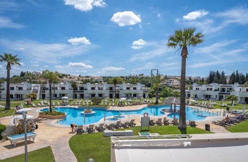 Alpouvar Apartment | Sunny Flat with a Balcony & Pool by HostWise
