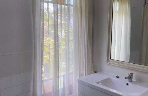 Scotts Head House | The Q Cottage - rustic charm and walk to beach