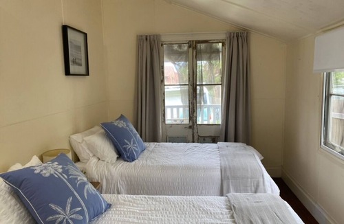 Scotts Head House | The Q Cottage - rustic charm and walk to beach