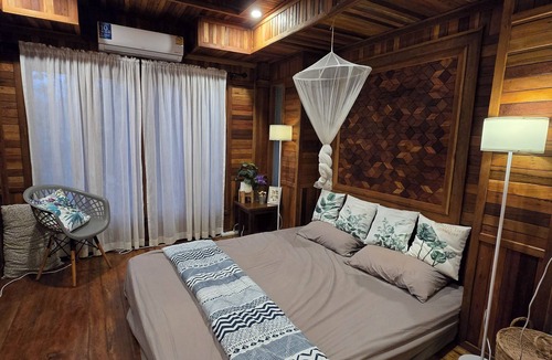 Kanchanaburi House | three little birds 2 bedroom (บ้านไม้กลางสวน)