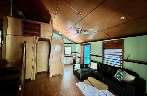 Wongaling Beach Apartment | Tropical Cabin Retreat