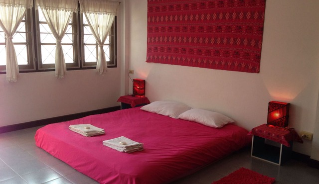Bedroom on a private floor with a king size bed and ensuite bathroom