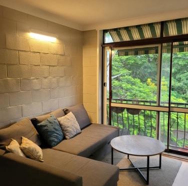 Breezy entire 2 bedroom unit top floor next to UQ