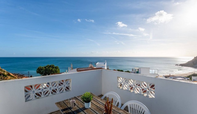 Comfy Flat W/Rooftop Beach View by LovelyStay