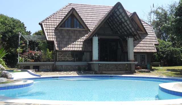 Cottage in the hill immersed in the tropical quiet