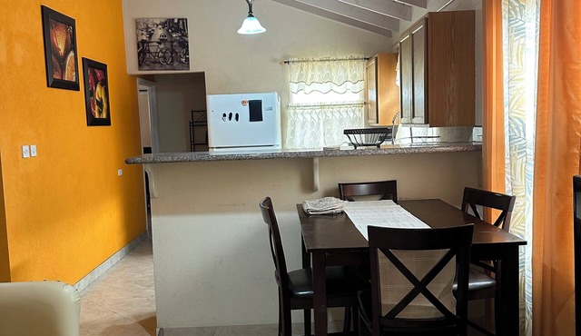 Cozy 3 bedroom 2 bathroom house in a secure neighborhood with dining & amenities