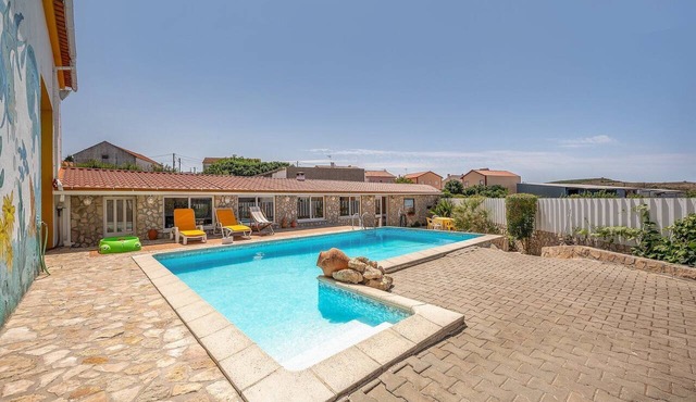 Eclectic oasis with poolside charm in Arranhó