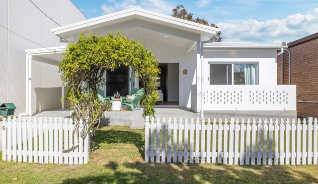 Experience the perfect blend of beachside charm and stylish holiday living