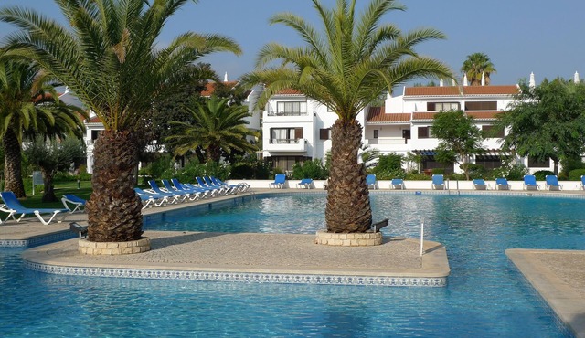 Ground Floor Apartment in Lakeside Village overlooking lake, pool and gardens.