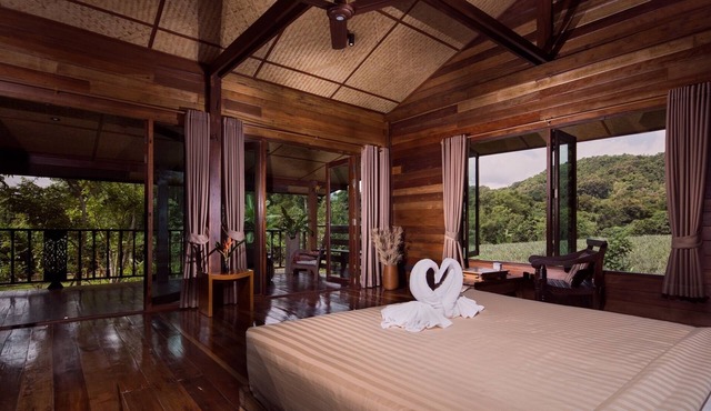 Stylish loft in stilted wooden longhouse