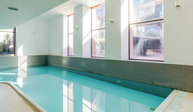 Stylish Open-Plan Flat with Swimming Pool by HostWise