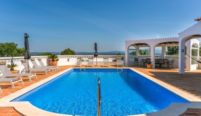 Tranquil one-level villa in Lagos with optional heated pool and large garden.
