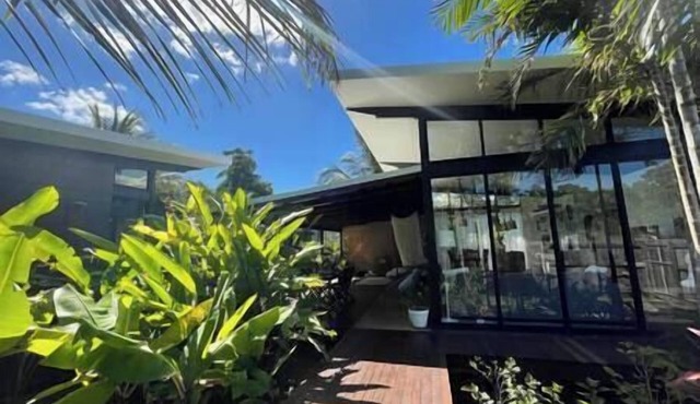 Tropical Modernist Retreat is set up as a contemporary beach abode