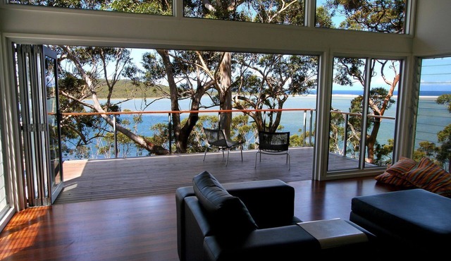Waterfront position with direct lake access, sandbar, ocean views.